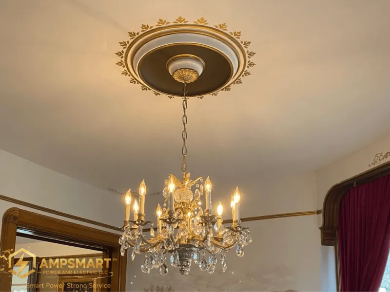 Chandelier with a refinished ceiling medallion